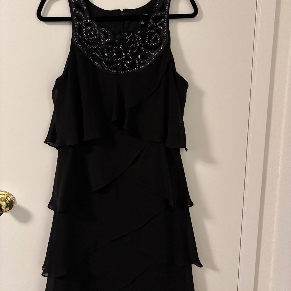 SL Fashions Black Tiered Cocktail Dress with Embellished Neckline